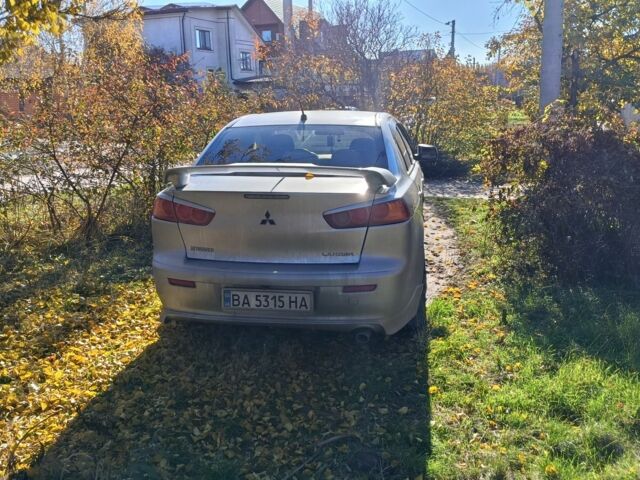 Серый Мицубиси Лансер Эволюшн, объемом двигателя 2 л и пробегом 230 тыс. км за 6600 $, фото 4 на Automoto.ua