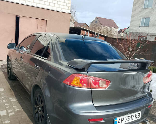 Серый Мицубиси Лансер Эволюшн, объемом двигателя 1.5 л и пробегом 203 тыс. км за 7900 $, фото 3 на Automoto.ua