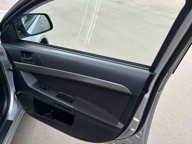 Сірий Міцубісі Лансер Еволюшн, об'ємом двигуна 1.5 л та пробігом 63 тис. км за 8500 $, фото 10 на Automoto.ua