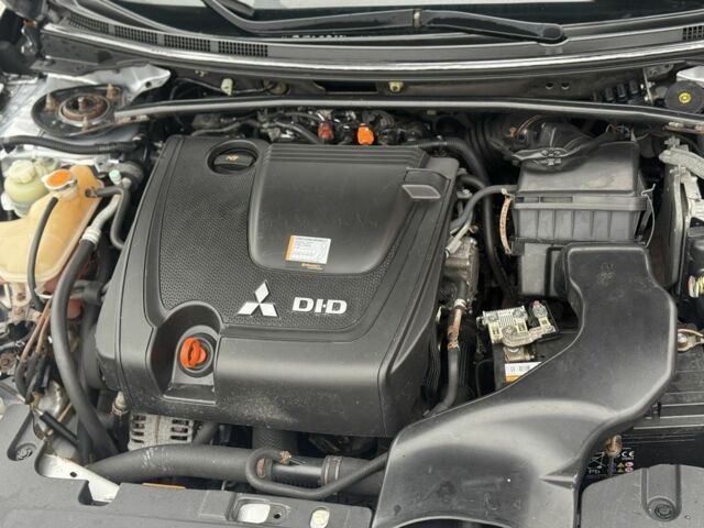 Серый Мицубиси Лансер Эволюшн, объемом двигателя 2 л и пробегом 300 тыс. км за 3500 $, фото 7 на Automoto.ua