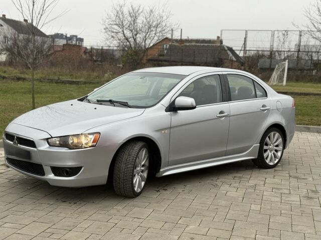 Серый Мицубиси Лансер Эволюшн, объемом двигателя 2 л и пробегом 300 тыс. км за 3500 $, фото 1 на Automoto.ua