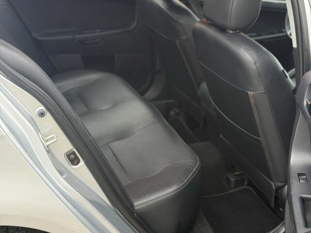 Серый Мицубиси Лансер Эволюшн, объемом двигателя 2 л и пробегом 300 тыс. км за 3500 $, фото 5 на Automoto.ua