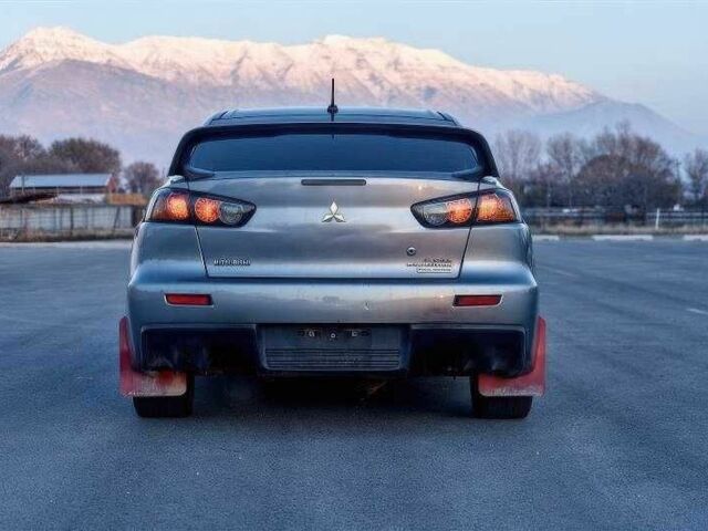 Сірий Міцубісі Лансер Еволюшн, об'ємом двигуна 2 л та пробігом 99 тис. км за 9100 $, фото 5 на Automoto.ua