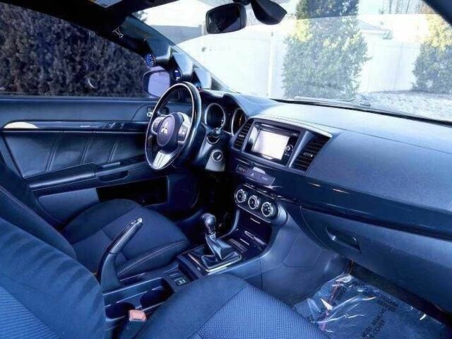 Сірий Міцубісі Лансер Еволюшн, об'ємом двигуна 2 л та пробігом 99 тис. км за 9100 $, фото 9 на Automoto.ua