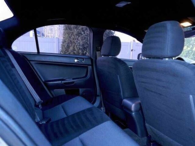 Сірий Міцубісі Лансер Еволюшн, об'ємом двигуна 2 л та пробігом 99 тис. км за 9100 $, фото 8 на Automoto.ua