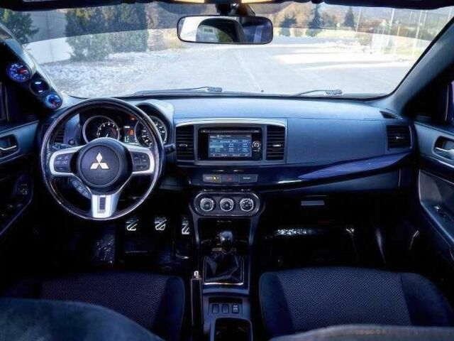 Сірий Міцубісі Лансер Еволюшн, об'ємом двигуна 2 л та пробігом 99 тис. км за 9100 $, фото 12 на Automoto.ua