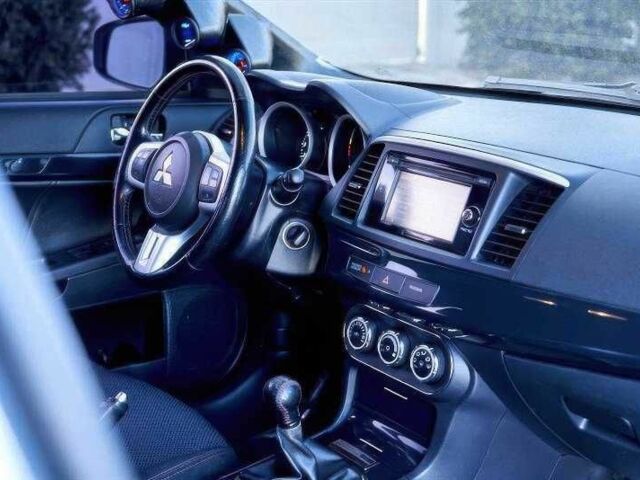 Сірий Міцубісі Лансер Еволюшн, об'ємом двигуна 2 л та пробігом 99 тис. км за 9100 $, фото 10 на Automoto.ua