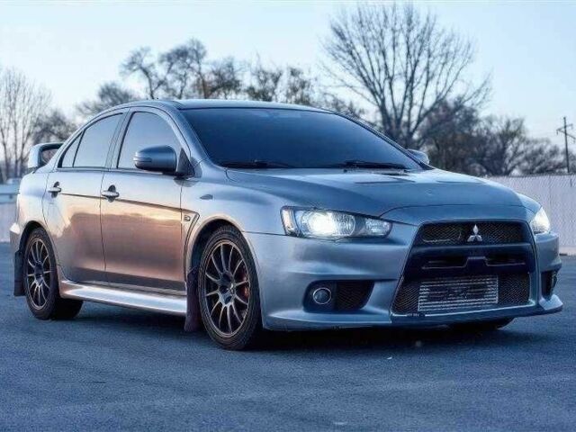 Сірий Міцубісі Лансер Еволюшн, об'ємом двигуна 2 л та пробігом 99 тис. км за 9100 $, фото 2 на Automoto.ua