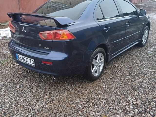 Синий Мицубиси Лансер Эволюшн, объемом двигателя 1.5 л и пробегом 210 тыс. км за 6600 $, фото 3 на Automoto.ua