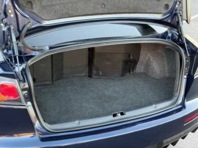 Синий Мицубиси Лансер Эволюшн, объемом двигателя 2 л и пробегом 144 тыс. км за 11000 $, фото 13 на Automoto.ua