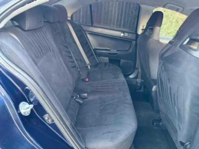 Синий Мицубиси Лансер Эволюшн, объемом двигателя 2 л и пробегом 144 тыс. км за 11000 $, фото 12 на Automoto.ua