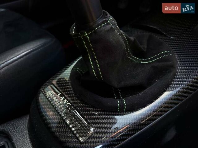 Зеленый Мицубиси Лансер Эволюшн, объемом двигателя 2 л и пробегом 135 тыс. км за 38500 $, фото 24 на Automoto.ua