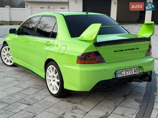 Зеленый Мицубиси Лансер Эволюшн, объемом двигателя 2 л и пробегом 135 тыс. км за 38500 $, фото 15 на Automoto.ua