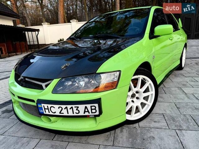 Зеленый Мицубиси Лансер Эволюшн, объемом двигателя 2 л и пробегом 135 тыс. км за 38500 $, фото 20 на Automoto.ua