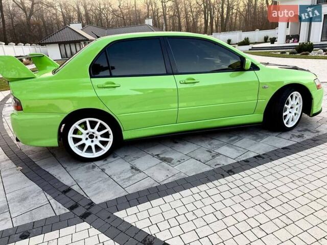 Зеленый Мицубиси Лансер Эволюшн, объемом двигателя 2 л и пробегом 135 тыс. км за 38500 $, фото 13 на Automoto.ua