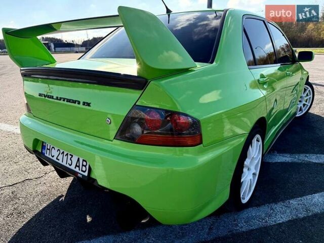 Зеленый Мицубиси Лансер Эволюшн, объемом двигателя 2 л и пробегом 135 тыс. км за 38500 $, фото 2 на Automoto.ua