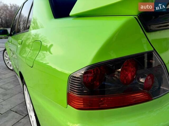 Зеленый Мицубиси Лансер Эволюшн, объемом двигателя 2 л и пробегом 135 тыс. км за 38500 $, фото 11 на Automoto.ua