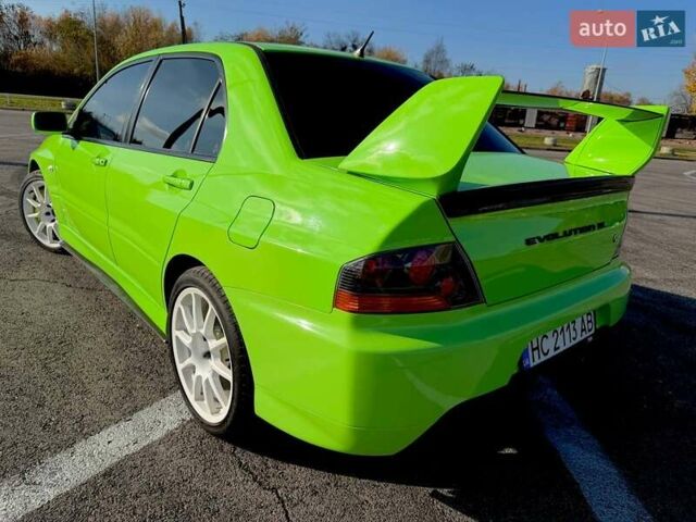 Зеленый Мицубиси Лансер Эволюшн, объемом двигателя 2 л и пробегом 135 тыс. км за 38500 $, фото 7 на Automoto.ua