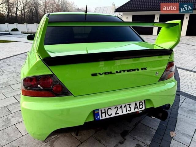 Зеленый Мицубиси Лансер Эволюшн, объемом двигателя 2 л и пробегом 135 тыс. км за 38500 $, фото 10 на Automoto.ua