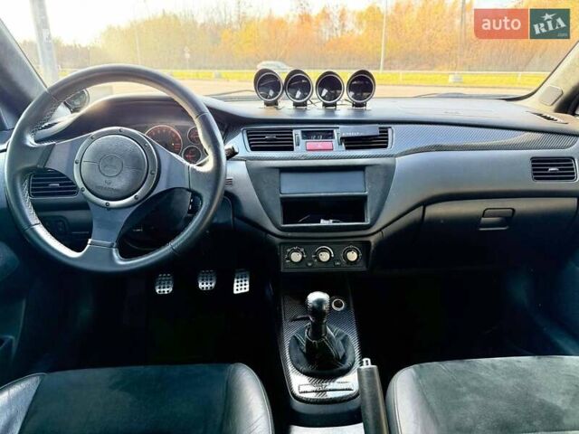 Зеленый Мицубиси Лансер Эволюшн, объемом двигателя 2 л и пробегом 135 тыс. км за 38500 $, фото 21 на Automoto.ua