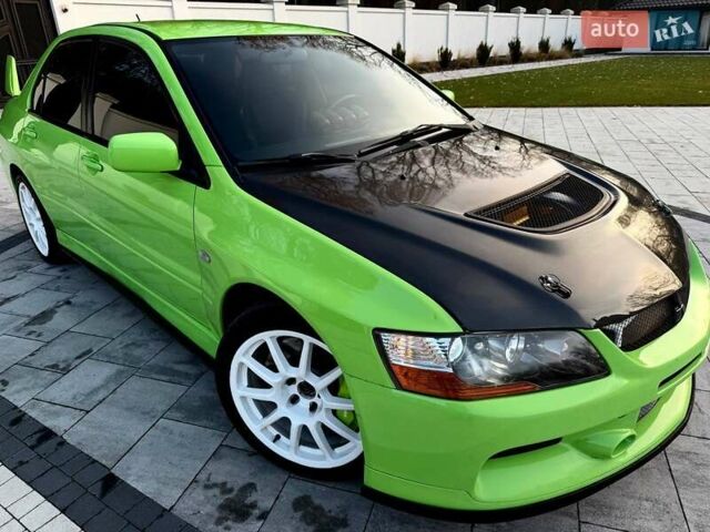 Зеленый Мицубиси Лансер Эволюшн, объемом двигателя 2 л и пробегом 135 тыс. км за 38500 $, фото 19 на Automoto.ua