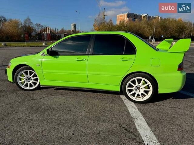 Зеленый Мицубиси Лансер Эволюшн, объемом двигателя 2 л и пробегом 135 тыс. км за 38500 $, фото 5 на Automoto.ua