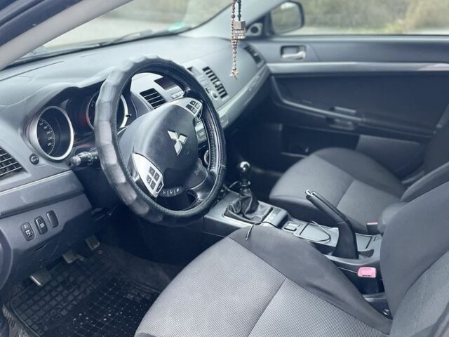 Чорний Міцубісі Лансер Спортбек, об'ємом двигуна 2 л та пробігом 333 тис. км за 6800 $, фото 4 на Automoto.ua