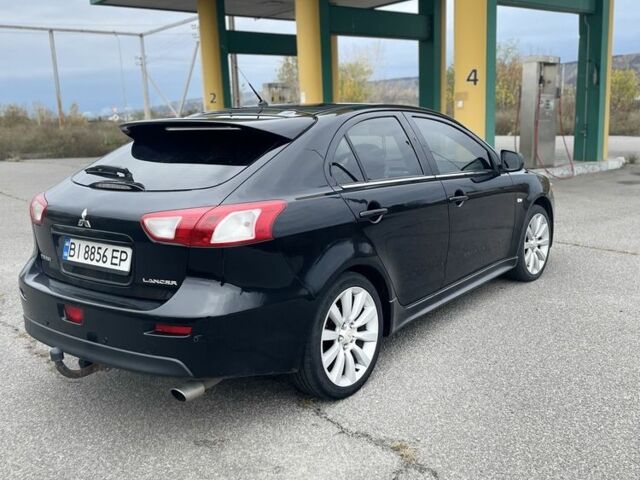 Чорний Міцубісі Лансер Спортбек, об'ємом двигуна 2 л та пробігом 333 тис. км за 6800 $, фото 2 на Automoto.ua
