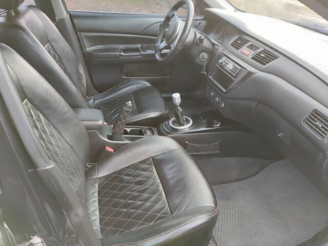 Черный Мицубиси Лансер Спортбэк, объемом двигателя 2 л и пробегом 219 тыс. км за 3999 $, фото 7 на Automoto.ua