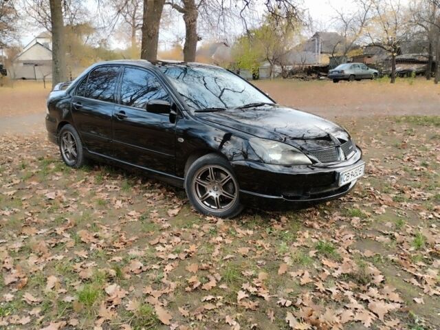 Черный Мицубиси Лансер Спортбэк, объемом двигателя 2 л и пробегом 219 тыс. км за 3999 $, фото 3 на Automoto.ua