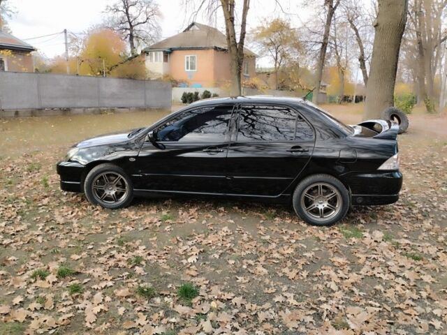 Черный Мицубиси Лансер Спортбэк, объемом двигателя 2 л и пробегом 219 тыс. км за 3999 $, фото 15 на Automoto.ua