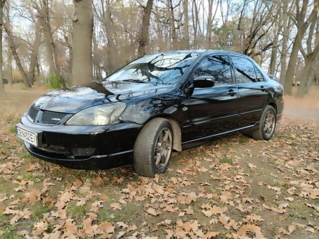 Черный Мицубиси Лансер Спортбэк, объемом двигателя 2 л и пробегом 219 тыс. км за 3999 $, фото 9 на Automoto.ua