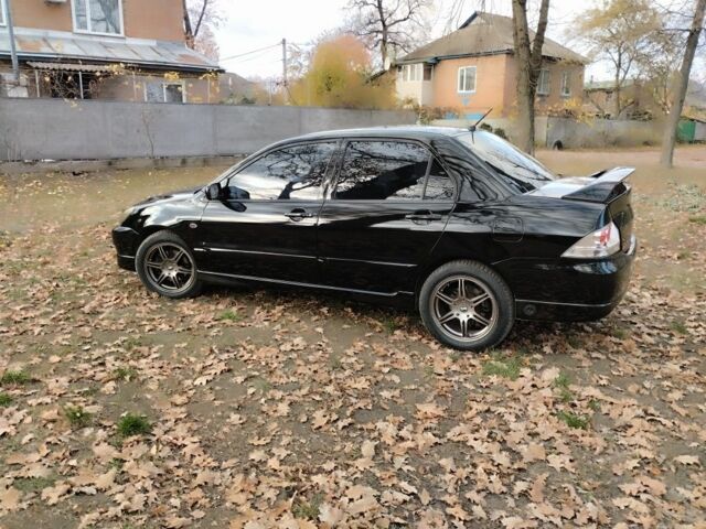 Черный Мицубиси Лансер Спортбэк, объемом двигателя 2 л и пробегом 219 тыс. км за 3999 $, фото 13 на Automoto.ua