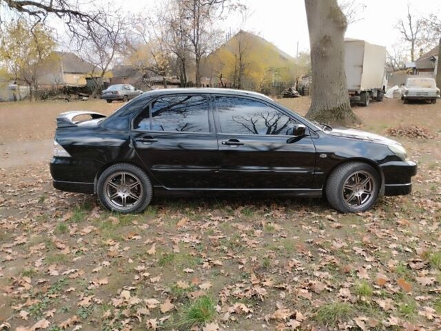 Черный Мицубиси Лансер Спортбэк, объемом двигателя 2 л и пробегом 219 тыс. км за 3999 $, фото 11 на Automoto.ua