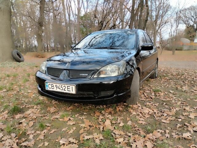 Черный Мицубиси Лансер Спортбэк, объемом двигателя 2 л и пробегом 219 тыс. км за 3999 $, фото 8 на Automoto.ua