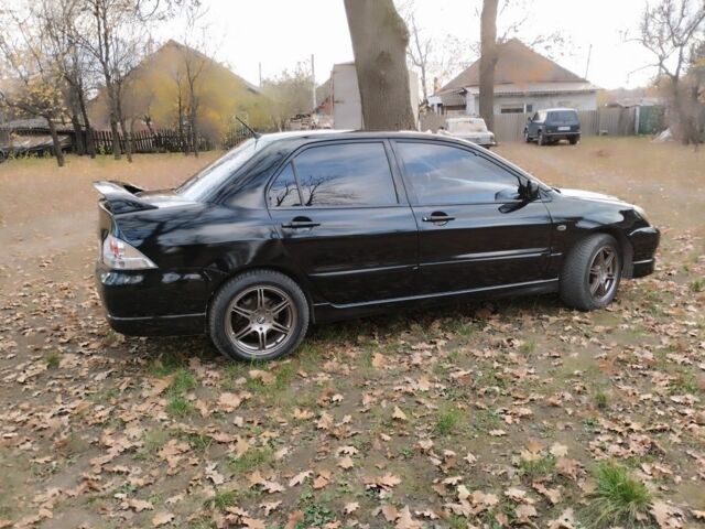 Черный Мицубиси Лансер Спортбэк, объемом двигателя 2 л и пробегом 219 тыс. км за 3999 $, фото 10 на Automoto.ua