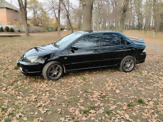 Черный Мицубиси Лансер Спортбэк, объемом двигателя 2 л и пробегом 219 тыс. км за 3999 $, фото 14 на Automoto.ua