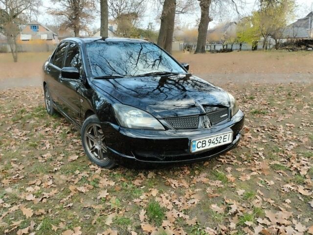 Черный Мицубиси Лансер Спортбэк, объемом двигателя 2 л и пробегом 219 тыс. км за 3999 $, фото 2 на Automoto.ua