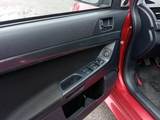 Красный Мицубиси Лансер Спортбэк, объемом двигателя 1.8 л и пробегом 318 тыс. км за 6850 $, фото 5 на Automoto.ua