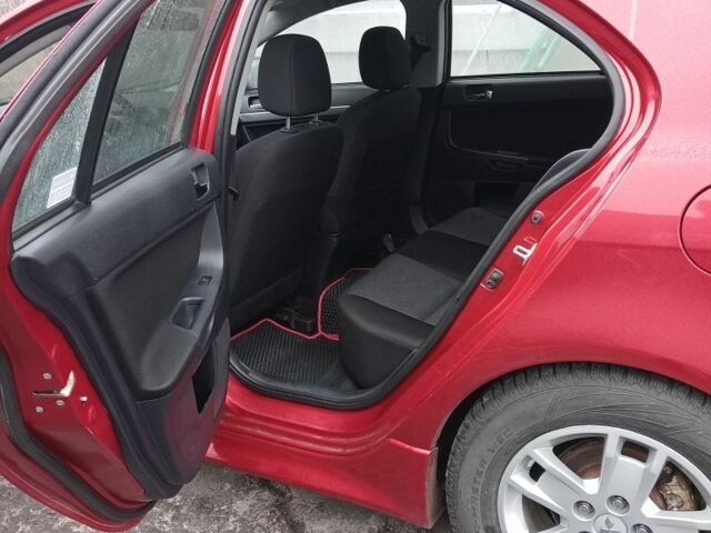 Красный Мицубиси Лансер Спортбэк, объемом двигателя 1.8 л и пробегом 318 тыс. км за 6850 $, фото 12 на Automoto.ua