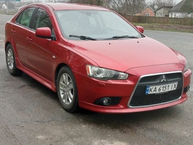 Красный Мицубиси Лансер Спортбэк, объемом двигателя 1.8 л и пробегом 318 тыс. км за 6850 $, фото 1 на Automoto.ua