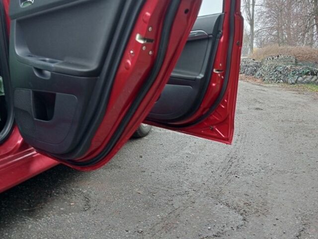 Красный Мицубиси Лансер Спортбэк, объемом двигателя 1.8 л и пробегом 318 тыс. км за 6850 $, фото 7 на Automoto.ua