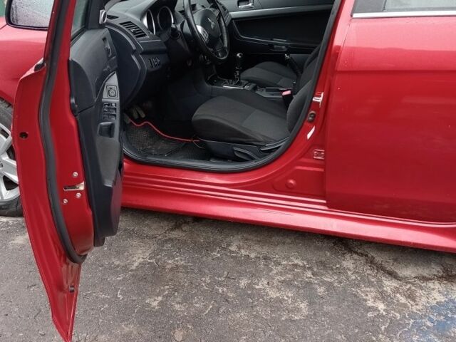 Красный Мицубиси Лансер Спортбэк, объемом двигателя 1.8 л и пробегом 318 тыс. км за 6850 $, фото 15 на Automoto.ua