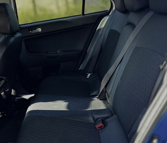 Синій Міцубісі Лансер Спортбек, об'ємом двигуна 2 л та пробігом 185 тис. км за 7499 $, фото 9 на Automoto.ua