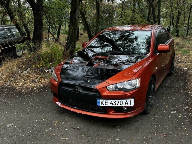 Оранжевый Мицубиси Лансер Спортбэк, объемом двигателя 2 л и пробегом 165 тыс. км за 8000 $, фото 1 на Automoto.ua