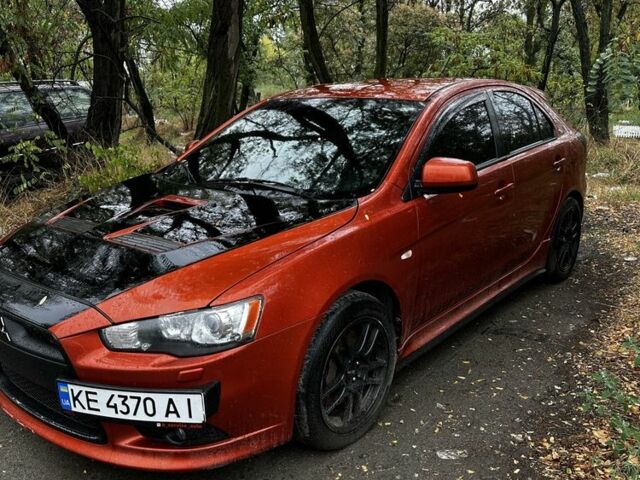 Оранжевый Мицубиси Лансер Спортбэк, объемом двигателя 2 л и пробегом 165 тыс. км за 8000 $, фото 2 на Automoto.ua