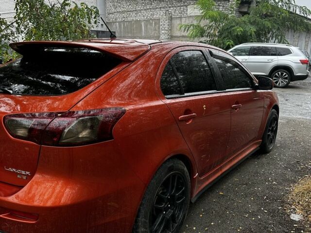 Оранжевый Мицубиси Лансер Спортбэк, объемом двигателя 2 л и пробегом 165 тыс. км за 8000 $, фото 5 на Automoto.ua