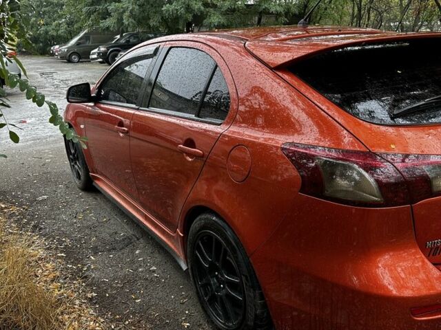 Оранжевый Мицубиси Лансер Спортбэк, объемом двигателя 2 л и пробегом 165 тыс. км за 8000 $, фото 4 на Automoto.ua