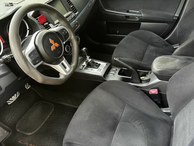 Оранжевый Мицубиси Лансер Спортбэк, объемом двигателя 2 л и пробегом 165 тыс. км за 8000 $, фото 7 на Automoto.ua