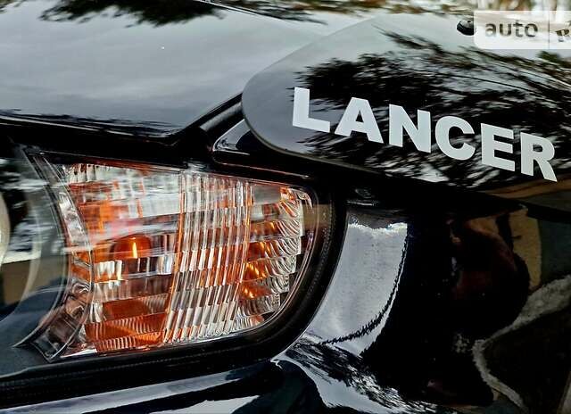Черный Мицубиси Лансер Х, объемом двигателя 2 л и пробегом 48 тыс. км за 9670 $, фото 44 на Automoto.ua